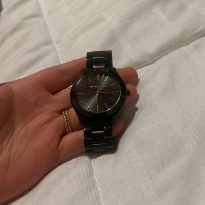 Black and gold Michael kors watch